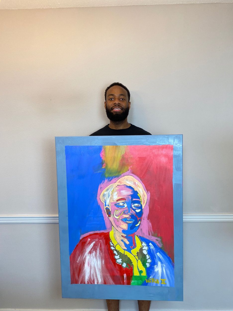 Willie Austin holding his colorful portrait of his grandmother in red, yellow and blue